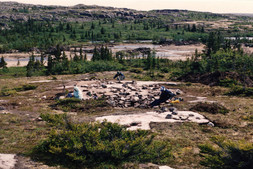Excavation of tent structures 6 and 7, 1991, facing east