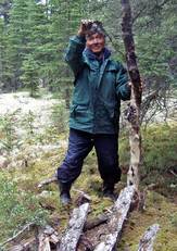 Willie Kumarluk explains how fox traps work. Taken at site HaGe-11, which was abandoned by Kumarluk’s family in 1956, Summer 2004