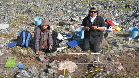 Qautsalik Naqtai and Joanassie Inukpuk excavating on IcGm-25, summer 2012.